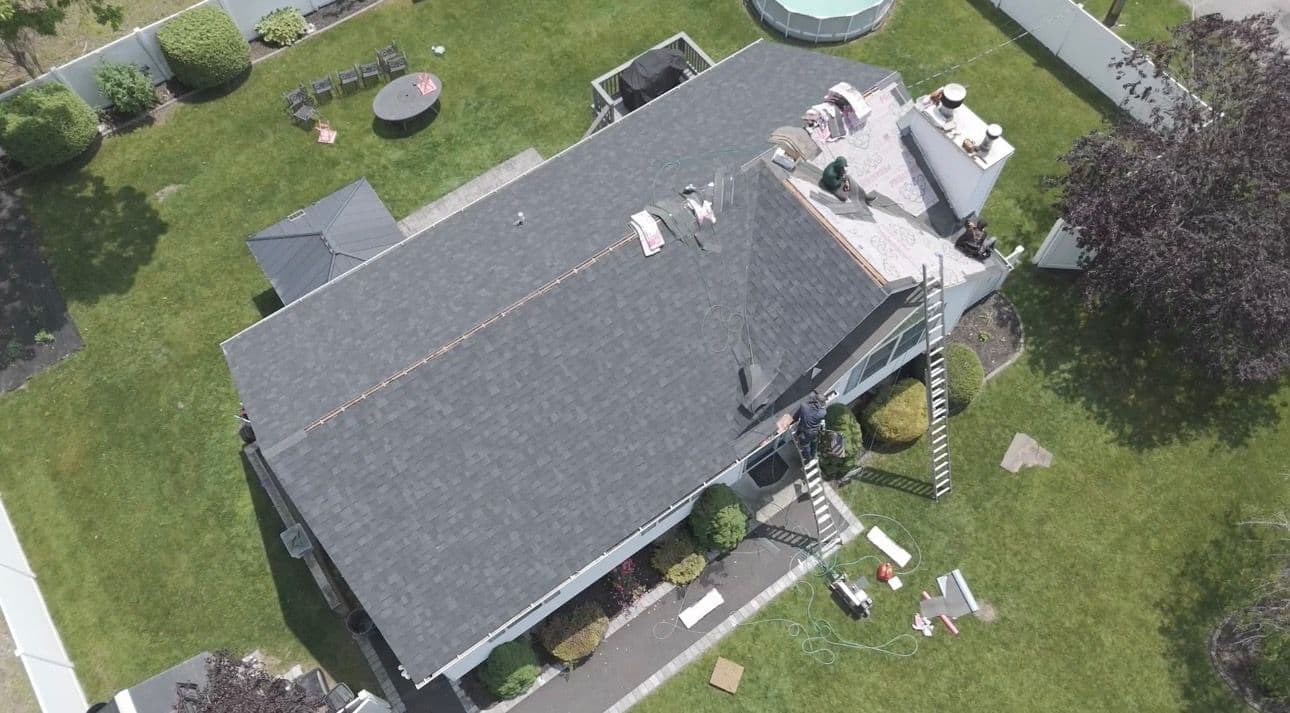 Residential Roofing Experts Offer Peak Protection image